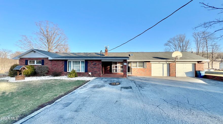 Move-in ready brick ranch home with a saltwater in-ground pool offering endless opportunities with a detached apartment, heated 40'x50' garage, 20'x40' garage, 40'x50' lean-to, and large blacktop parking lot. Both garages and lean-to have new metal roof. The main house has recently been remodeled with many new amenities and offers 2 bedrooms, 3 baths, kitchen, dining room, living room, laundry room, finished basement, bonus bedroom in basement, breezeway, and an attached two-car garage. Outside, you will find a in-ground salt water pool, composite deck, 1-bedroom/bath apartment, oversize garages, and lean-to. This property would make a great location for someone with a trucking or equipment business located not far from town with rental possibilities.