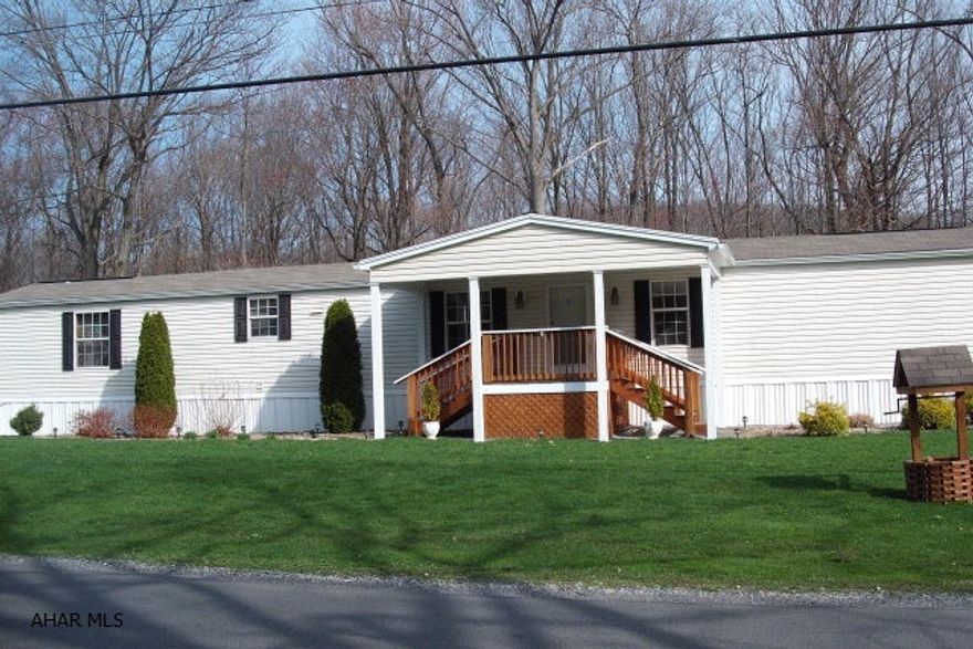 This is a 2006 Fleetwood 16x76 Mobile Home with front porch, large rear deck and many more upgrades. All appliances stay, there is also a 20x36 garage with own water and furnace. Beautiful lot that is owned. This property can be financed Conventional or FHA. This is a must see!