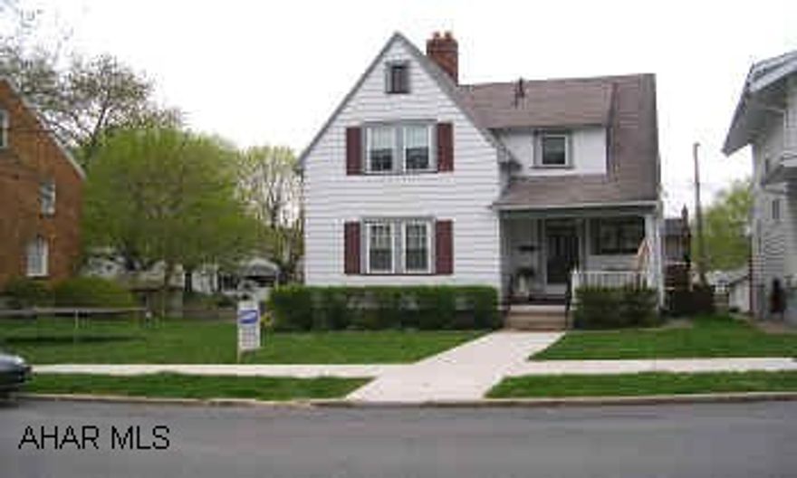 VERY CHARMING AND WELL MAINTAINED.  GREAT LIVING ROOM AND DINING ROOM WITH HARDWOOD FLOORS.  MODERN KITCHEN AND BATHS.  THIS HOME IS A MUST SEE!  FENCED LOT, LARGE DECK.  1 CAR GARAGE.