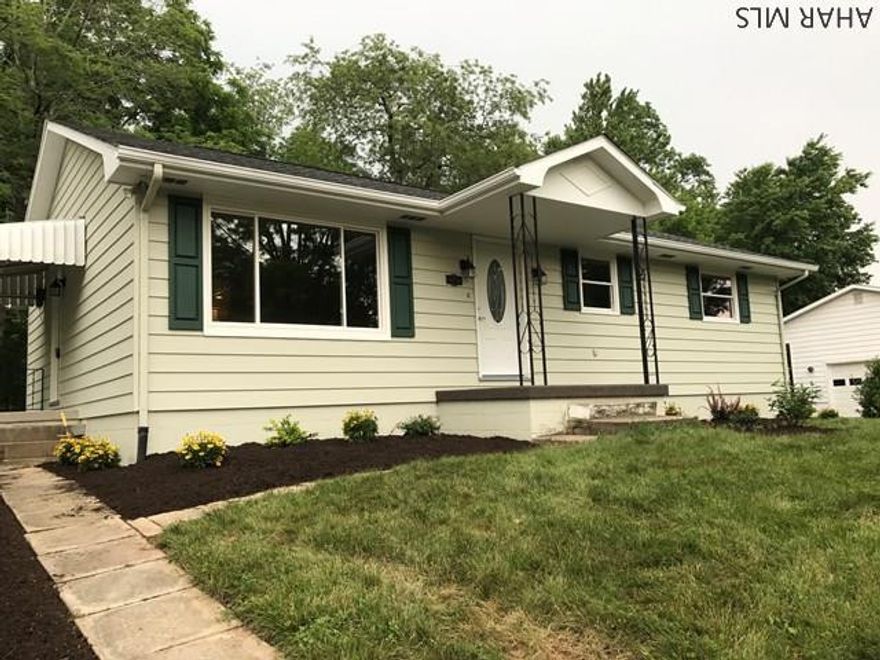 HOLLIDAYSBURG SCHOOLS.  Walk to park in Duncansville! 2 bed 2 bath. 100x120 lot on dead end street in lovely, quiet and secluded neighborhood! New and beautiful granite and stainless kitchen with island.  2 updated baths.  New tile, hardwood lino, and carpeting throughout, new doors, roof and more! 1st floor laundry room with utility sink. Finished tile floor family room with French door walkout to lawn area with stream at back of property. 2 car garage.  Central air.