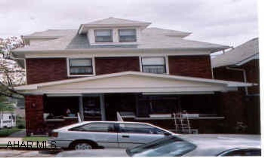 Solid Brick - New Roof-Electric- Solid Oak Trim Thru-Out Mint Condition Inside & Out. Beveled Glass French Doors-large spacious rooms-Loads of storage