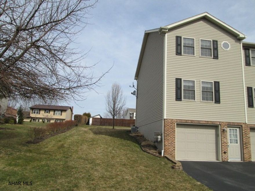 Hollidaysburg/Penn Farms townhouse.  This unique townhouse offers large side lot to be included.  Enjoy the warm weather outdoors with this spacious lot size.  This pristine townhouse is better than new and all kitchen appliances are included. Perfect area with a great view.