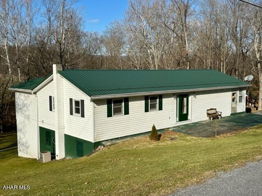 An excellent find in Chestnut Ridge School District!    3 bed 1.5 bath ranch home situated on 2.5 acres.   Wonderful back deck with view of Dunnings Creek.   Large living room, updated kitchen with hickory cabinets and newer appliances.   Central AC, integral garage, NOT in a flood zone!   Priced to sell @ 169,900.   Give us a call today!