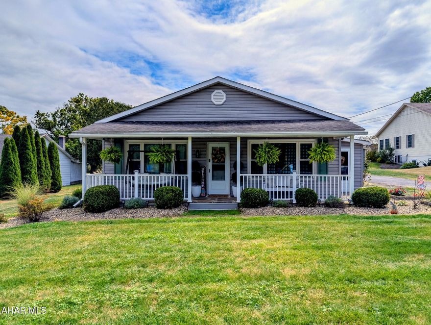 You will absolutely love this clean, easygoing 1,380 sq ft bungalow sitting on a level .67 acre lot in the Chestnut Ridge school district. It's truly move in ready, no rehab, no fuss, just bring your things and start living. Enjoy morning coffee on the covered front porch and evenings on the covered rear patio. Above ground pool for hot days and a detached 2 car garage for parking, projecting or storage. The yard is big and flat, so whether you want a garden, play space, or room to expand, you've got options. Inside, the layout is practical and bright with well kept finishes throughout.  Spacious living areas, updated bathroom, flooring, carpeting and more.  If you're looking for a turnkey home in a great school district, this one is sure to check all the boxes. Give us a call today to make this wonderful house your new home!