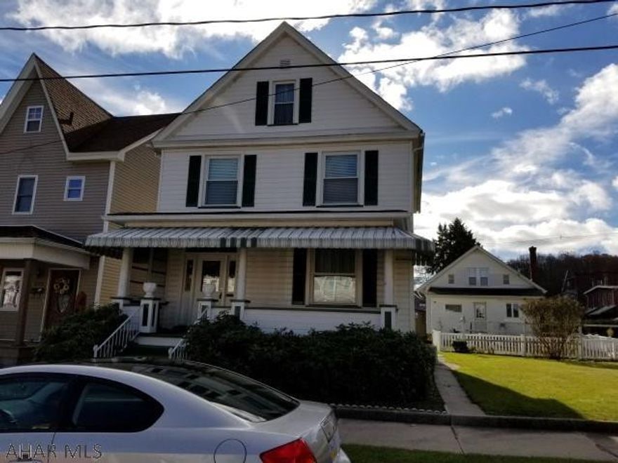 Well maintained, 2 1/2 story 4 bedroom home with 2 full baths. Hardwood floors. Enclosed rear patio. Detached garage.