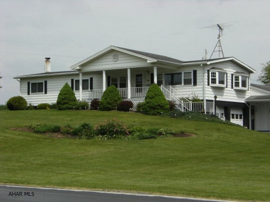 Lovely, peaceful setting with a well kept one story home. Featuring 2 car integral garage plus a great two car attached garage with heat and workshop. Covered front porch for relaxing and enjoying the beautiful country view and partially covered patio in back for family BBQ's. A must see property.