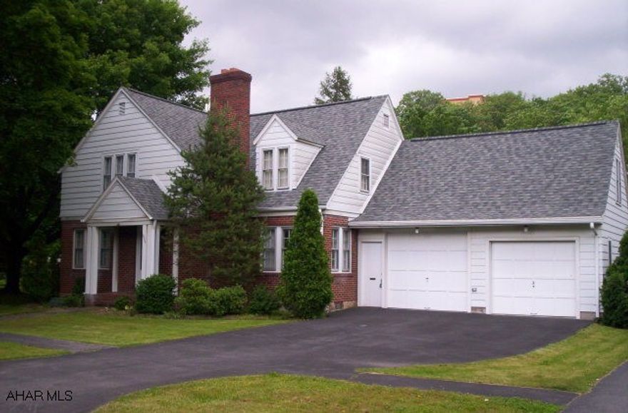 Wonderful location in Mansion Park area.  Brick and frame home with large corner lot.  Fireplace, central ac, rear patio, 2 1/2 baths, finished room over garage.