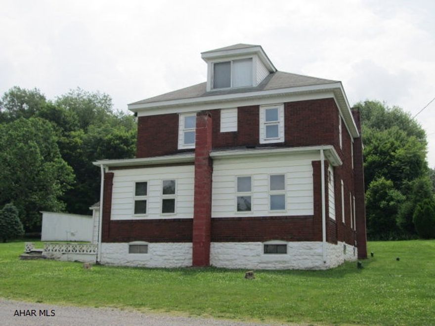 Logan Township all brick 4BR with large detached 2 car garage. If you are looking for low taxes and low utilities this is it on a large flat lot size. The kitchen appliances are included. Large storage unit is included.