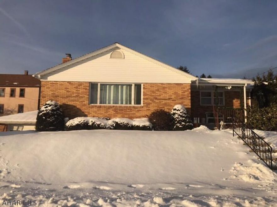 Nice brick rancher in Ebensburg Borough.  This property qualifies for a USDA Loan (no money down). You'll love the vaulted ceiling and wood-burning fireplace in the living room.  This home has an open floor plan with 4 bedrooms, 2 bathrooms, and a family room.  There is also a 3/4 bathroom in the basement (not enclosed) along with tons of storage.  The Ghost Town Trail and the ball fields are just steps away.  One-year home warranty included.