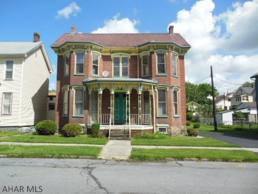 New Price!  'A Diamond in the Rough!"  Unique Historic Hollidaysburg Circa 1880, Stately All-Brick 4 BR, 3 bath home with large 2 car detatched garage, and good-sized shed. New 100 amp breakers, copper plumbing, NG furnaces, newer cabinets and appliances, full bath on each floor, large double lot has an easement on side of lot (never noticed used), high ceilings, had a fireplace in the dining room at one time.  Plenty of off-street parking, rear patio, nice landscaping and more.  The most prominent home on the block! Don't let it slip by if you'd like to experience the charm of this type of home on a quieter block.  Shopping, restaurants, and courthouse close by...  Take a look at what others Sold for!  Call for an appointment!  Reasonable offers considered!! .