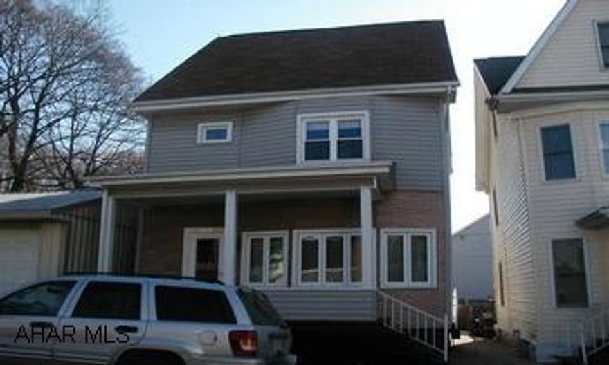 New Windows, New Furnace, Newer Carpet, New Bathtub with insert. Heated third floor could be 3rd bedroom.