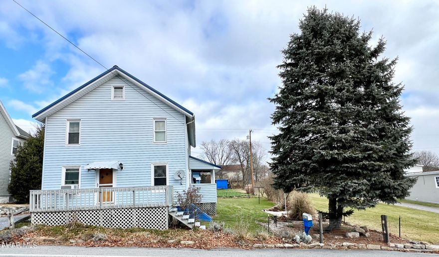 Updated two-story home offering 2 bedrooms and 1 bath. The first level features a living room and a large eat-in kitchen. The second level offers two bedrooms and a full bathroom. Outside, you will find a front porch, side covered porch, dog kennel, 6-car carport, 2 sheds, and a large yard with a garden.