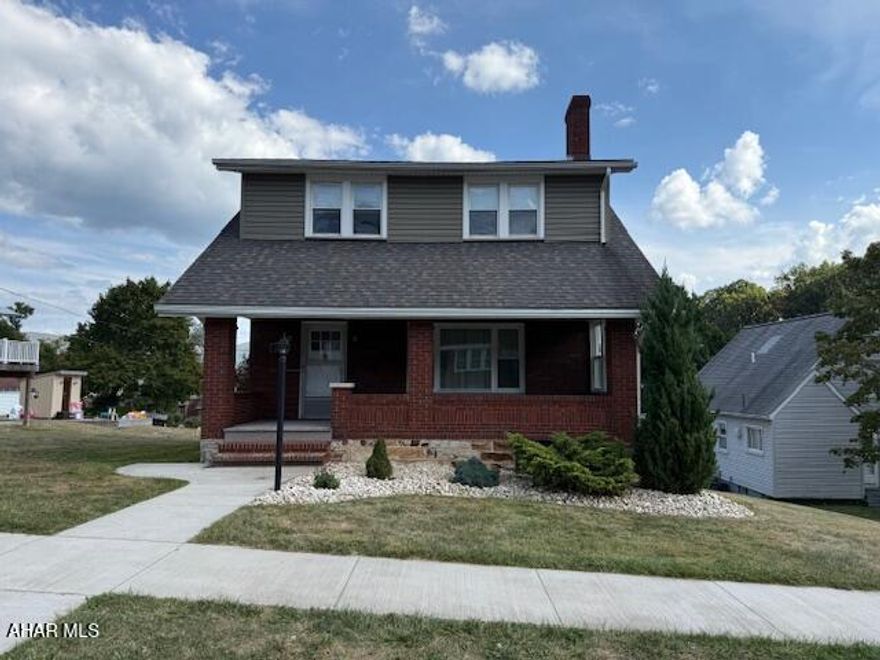 Brick Beauty for sale in Altoona. Nestled in the heart of Altoona's Calvert Hills neighborhood, this delightful two-story residence, constructed in 1920 exudes timeless charm and character. Key features: kitchen has cherry cabinets with granite cabinets, hardwood floors in all bedrooms, large bathroom, wood fire place and two car garage. This home sits on two parcels.