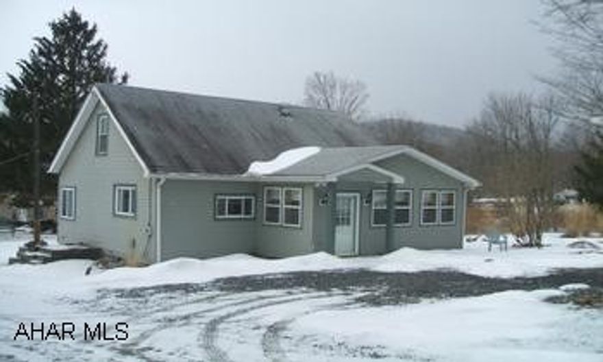 Maintenance-free home on beautiful lot in private setting. New carpet to be installed in living room & bedroom on 3/7/07. Heated 2nd floor could be 2nd bedroom.
