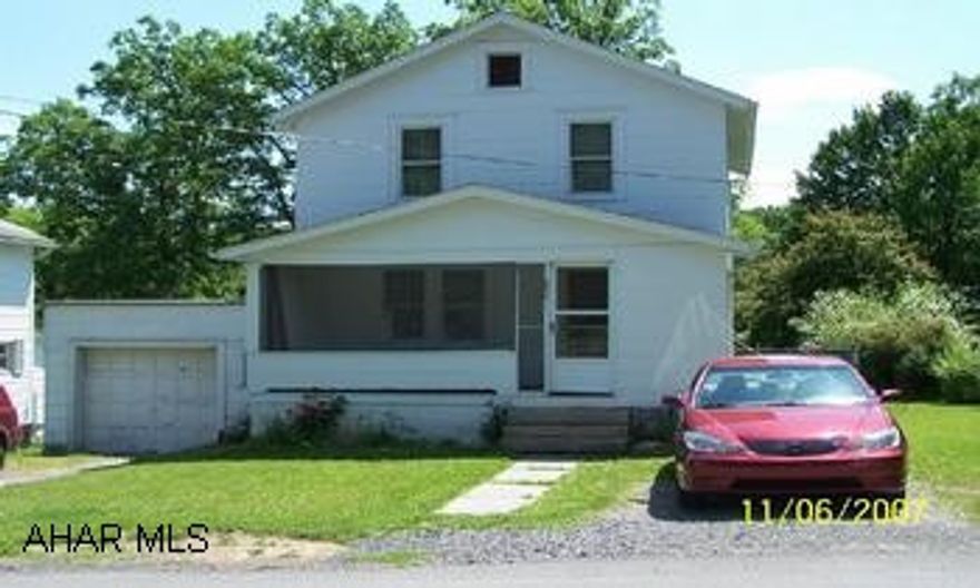 Cute 2 story ready to move in.  Beautiful yard in bloom!  Large deck covering a flagstone patio in the back featuring beautiful flowers and a fenced yard. Westwood Water Authority shared well $25/month-Water Bill. Juniata Gap Road past PSU Altoona Campus (approx. 1mi.past Elementary School). Turn Right @ Westwood Park.  At stop sign, turn left.  Property is 6th house on left.  Cute 2 story featuring an updated energy efficient furnace w/CA.  Douglas Fir wood flooring under carpet.