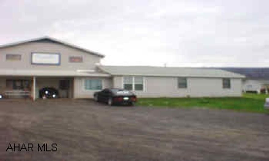 5 unit complex, all apartments have own entrance, 3 have porches. New addition in 2000.