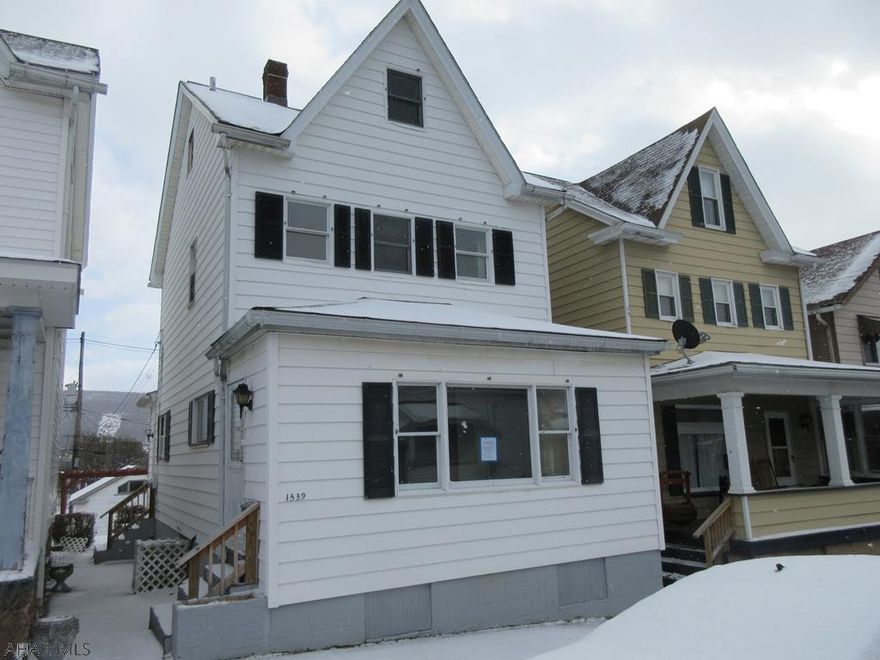 Altoona vinyl 2 story has some nice updates. Large, open living rom area, formal dining and nice eat-in kitchen. Over-sized detached 1 car garage with wood burner and plenty of room for a workshop.  AS-IS sale. Seller will make no repairs.