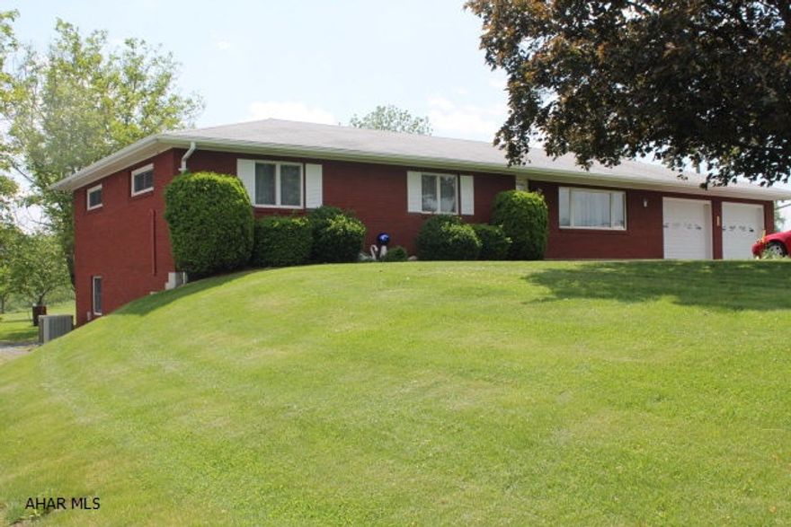 This 4 Bedroom Immaculate Ranch sits on 1.49 acres of beautiful country. Each room is spacious with plenty of space, attached 2 car garage with 2 extra buildings. Yard is flat and well taken care of. Property is a must see....