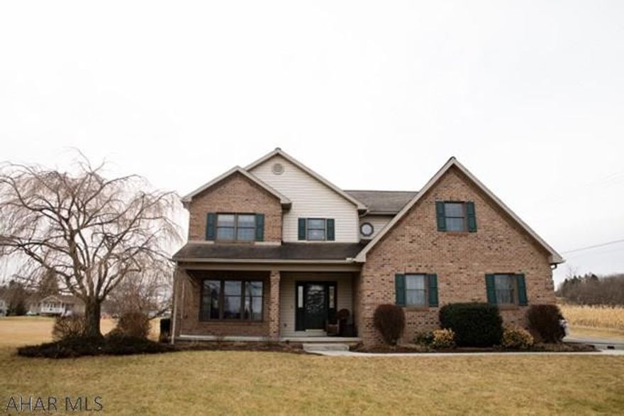 Custom built brick/vinyl home, located on 2.148 acres. Outside features a heated in ground pool, pool house w/ bath facilities. Detached 2 car garage, attached 2 car garage and a Bank Barn w/ many uses. Easy care landscaping, great rear patio and front porch, paved driveway. Walk inside to the hardwood foyer. Open concept kitchen w/ breakfast nook looks into the inviting family room w/ wood fireplace. Formal dining and living room w/ lovely natural light from the many windows. Laundry room and half bath complete the main level. Grand staircase leads to 4 large bedrooms and full bath. The master features a walk-in closet and master bath. Home has crown molding through out and many other custom touches. Basement has a large semi finished family/game room, storage and utility areas.