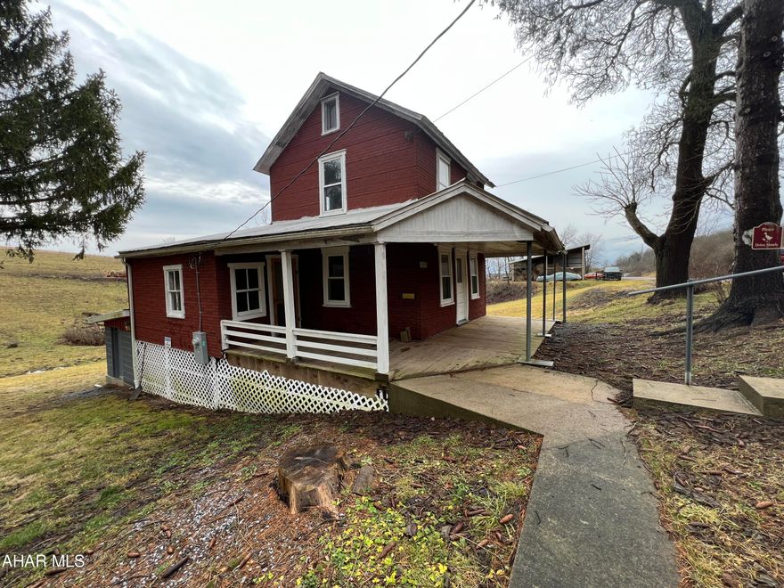 Two story house in the Country. The main floor offers a eat-in kitchen, Dining Room, living room, and full bath. The second floor offers one large room used as a bedroom. Outside you will find a covered front porch and large carport.