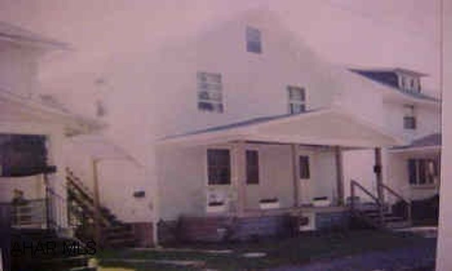 Nice home w/ new windows, siding, roof, furnace, kitchen.  Presently set up as a duplex w/ sec. 8. Could be single family very easily