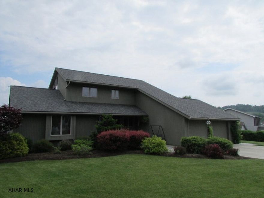 LOOKING FOR UNIQUE AND SPECIAL..THIS IS IT. OFFERING 1ST FLOOR MASTER BEDROOM WITH HOT TUB ROOM ATTACHED WHICH OPENS TO THE WRAP AROUND DECK. THE GREAT ROOM HAS THE FLOOR TO CEILING STONE FIREPLACE. LAUNDRY IS ALSO ON 1ST FLOOR. ALSO SCREENED IN PORCH OFF OF DINING AREA.  FAMILY ROOM IN BASEMENT HAS A BAR...COULD HAVE A WOODBURNER. EXTRA ROOM HAS A SAUNA RIGHT NOW..WHICH IS NOT STAYING.....THE BEST PART IS THAT THE LOWER LEVEL ALSO IS WALK OUT TO THE FANTASTIC BACK YARD, WHICH IS FENCED IN....HAS A SHED....PAVERS EVERYWHERE.....GREAT VIEW OF CHIMNEY ROCKS.....AND PRIVATE....DONT MISS IT! ALSO, BEAUTIFUL PERENNIALS..  HOME  WARRANTY   INCLUDED  !