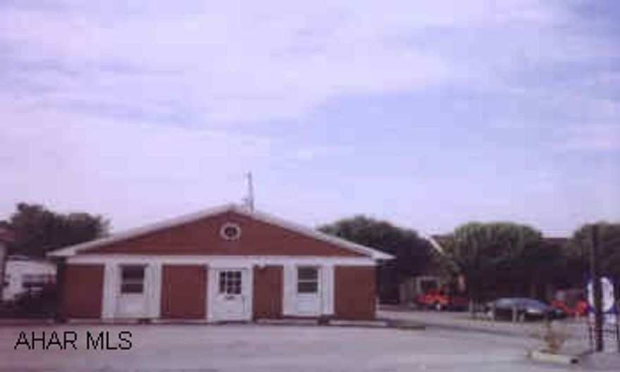 APPROX. 1600 SQ. FT. COMMERCIAL BUILDING JUST OFF OF I-99. MANY POSSIBILITES.