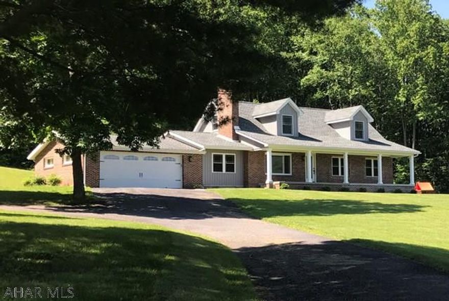 Gorgeous renovated home with 18 +/- acres nestled in the hillside with stunning views. A large covered front porch opens onto an open concept great room with spacious kitchen. The sunroom with abundant natural light is adjacent to the great room making entertaining a joy. The convenience of large main floor master suite with huge walk in closet and amazing master bathroom will delight even the most discriminating buyer. A guest bathroom & laundry room complete the first floor. A bedroom and huge bonus room with additional beautiful guest bathroom complete the second floor. Too many updates to list. Must see to appreciate!