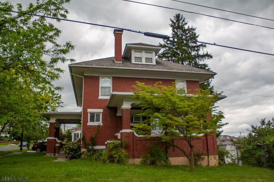 Large Brick Single Family home (Previously) a duplex..So many possibilities. Home features 4-5 bedrooms, 2 full baths and 2 laundry hook ups . Large eat in Kitchen. Pocket doors on the first floor are beautiful. Large basement and walk up attic. Carport.3D tour