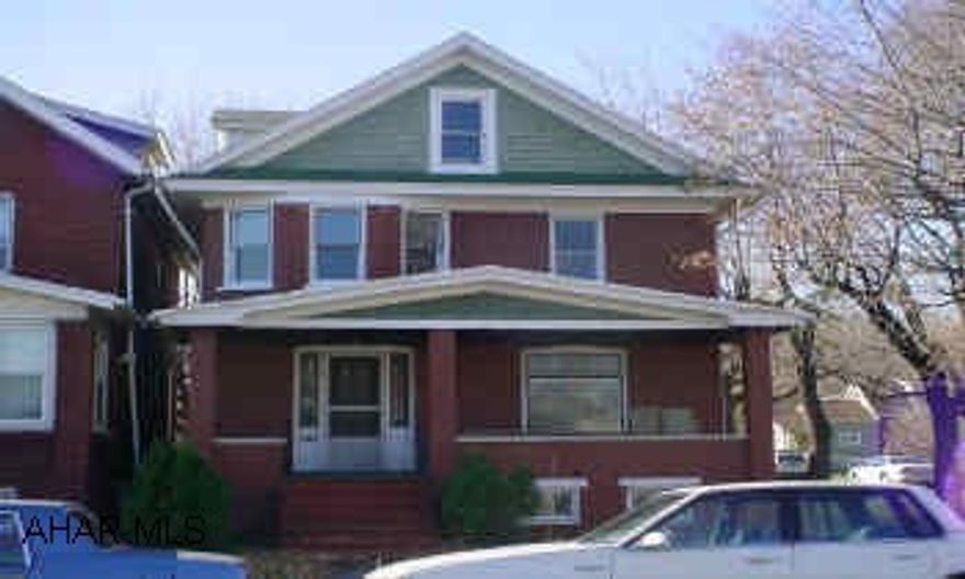 Large 2 1/2 story brick in Juniata.  Second floor has been gutted.  First floor needs  kitchen remodeled, floor covering throughout and first floor bath needs redone.   SELLER MUST SELL "AS-IS".