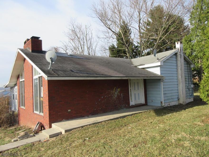 Nicely sized Duncansville area home with loads of possibilities! Features large living room w/ vaulted ceiling, brick FP with adjoining kitchen and dining room for open concept living. 3 bedroom plus adjoining room off master BR for nursery or possible 5th bedroom. Finished basement includes family room with woodburner, bath and 2 extra rooms. Needs some work, but could be really nice for the right buyer!  Property sold AS-IS. Seller will make no repairs. Offers must be submitted through HUD approved broker. Buyer pays both transfer taxes. Exclusive Agency. Equal Housing Opportunity. Property located on private lane w/ maintenance agreement - ask listing agent for details. Active roof leak. Evidence of basement flooding.