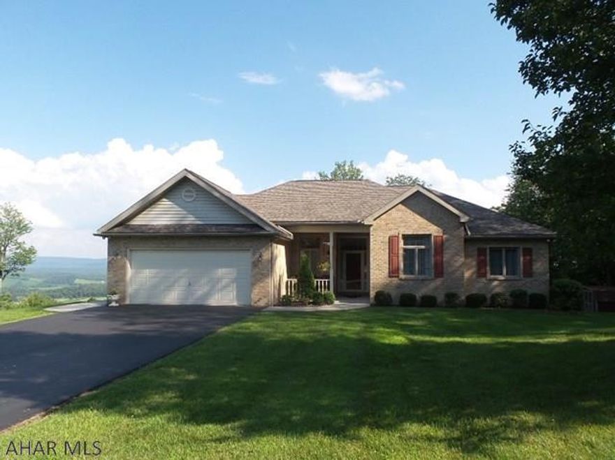 This ranch home is located in the highly sought after Laurel Heights development in Warriors Mark, central to Altoona and State College.  Upon entering, the spacious foyer featuring hardwood floors welcome you as you look thru the formal dining and living rooms to glimpses of the panoramic valley views to come.  Convenient main floor laundry has cupboard space and a pantry.  The eat-in, island kitchen offers an abundance of cabinet space and two pantrys, all appliances are included.  This opens to the sun room and the deck with magnificent views of Warriors Mark Valley.  Spacious bedrooms each with closets and the Master bedroom suite with a walk-in and linen.  The partially finished basement offers many possibilities and leads to a patio.  Don't miss this one of a kind, immaculate home!
