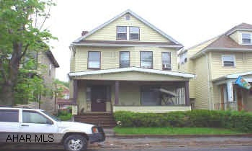 Nice 2 1/2 story with 4 bedrooms and a finished attic. 2 car garage.