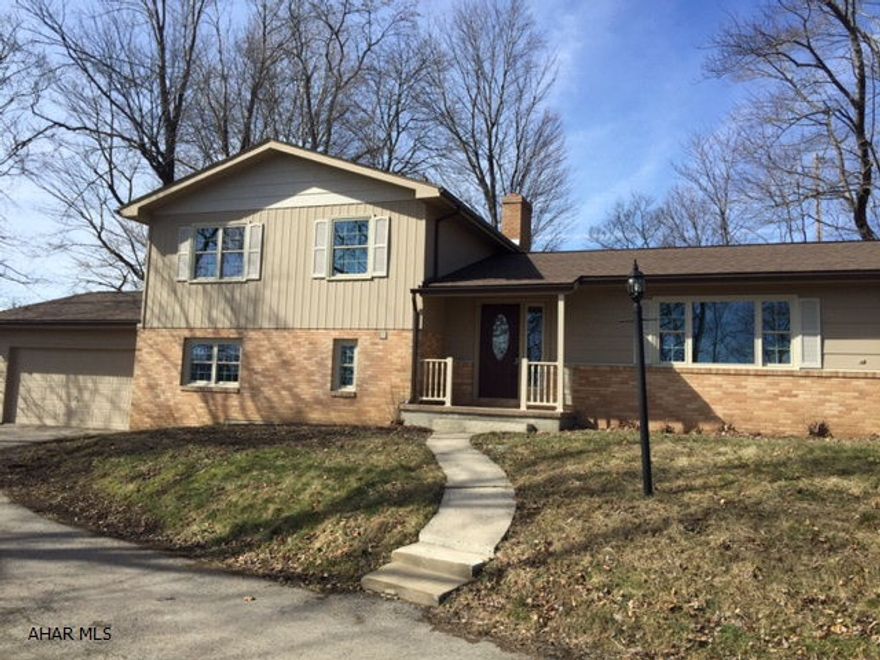 HIGLAND PARK AREA - Beautifully Renovated! Very large 4 level split with 4 car garage.(2 attached and 2 detached).  Treed lot is 150 x 120 and has nice level area with patio and deck. New kitchen with granite and stainless. 2 new baths. Hardwood floors.  New roof, deck, all interior and exterior doors and trim, windows, furnace, ac, and hot water tank.  Large family room has fireplace. Ground level entry has bedroom, 3/4 bath & could be suitable for extended family quarters. Lots of storage in additional basement that could be finished, as well as 2nd story of detached garage!  Don't miss the opportunity to live in updated home in sought after neighborhood.