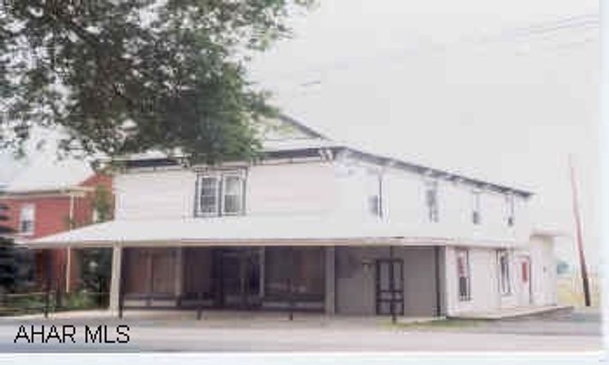 Building orginally used as store has over 3,200 sq ft.  Display windows, platform lift, loading dock.  New windows & vinyl siding.  Contingent upon Subdivision Approval.  J-516 Building orginally used as store has over 3,200 sq ft.  Display windows, platform lift, loading dock.  New windows & vinyl siding. Contingent upon Subdivision Approval.  J-516