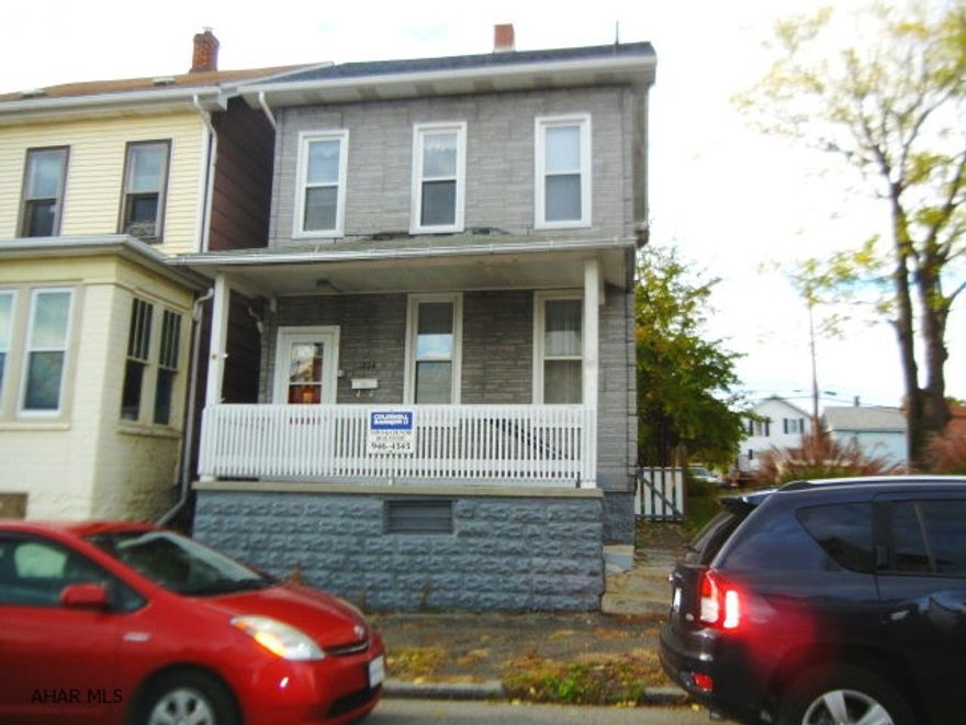 Great starter home or investment property.  Modern kitchen and bath.  Covered front and rear porch.  Alley access for offstreet parking.  Low taxes.  Could have 3rd bedroom on the 3rd floor (needs heat source).  Tilt-in windows.  At full price, Seller will replace rear porch roof and extend over basement entrance.