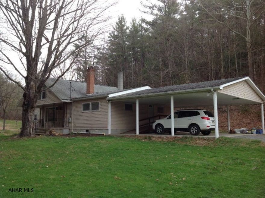 Nice 4 bedroom ranch home in the country!  Quiet and Peaceful with wildlife galore!!!3 car carport,10 acres of fields and 48 acres of woods. Running stream and a seasonal stream as well.  10 Miles fro.m I-68