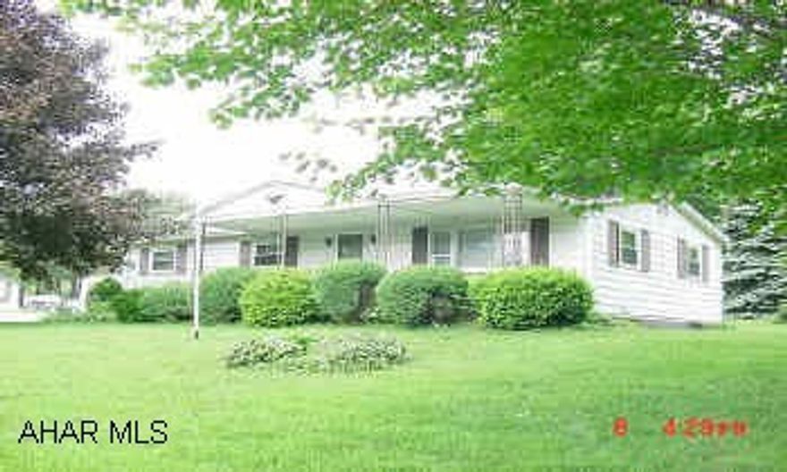 Ranch,  full basement w/ family room,  2 Car detached garage on large corner  lot in Cambria Heights School District This cute ranch has so many possibilities.  Great yard for children, large family room, pool table, nice covered front porch & sun room in back, large 2 car detached garage, private well, oil hot water heat .