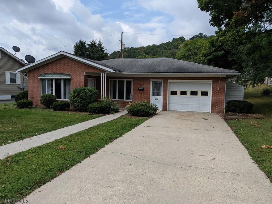 One story living in Bedford Borough. Brick rancher with enclosed porches to add living space. Huge skylight for natural light and large wood fireplace in the den. Lots of potential in this private setting in the borough.