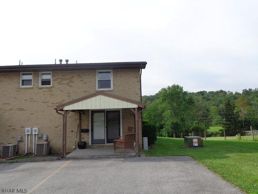 Beautiful grounds with a quiet country feeling is what you get at Maple Hollow Townhouses.  Low cost living is possible!  Well maintained end unit with basement.  $150/mo Association Fee includes all exterior maintenance including roof, grass cutting, snow plowing, trash removal, swimming pool use.