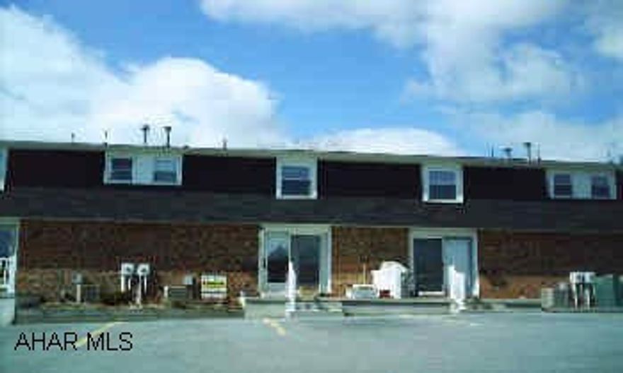 2 bedroom with partially finished basement. New hot water tank installed March 2006.   Maple Hollow Townhouses. A very nice, well kept 2 BR townhouse with partially finished basement. Seller needs to find suitable housing. Association fee $130.00 includes swimming pool, trash removal, all outside maintenance, snowplowing, grass cutting, and roof. Please call Tracy for more details 937-8197.