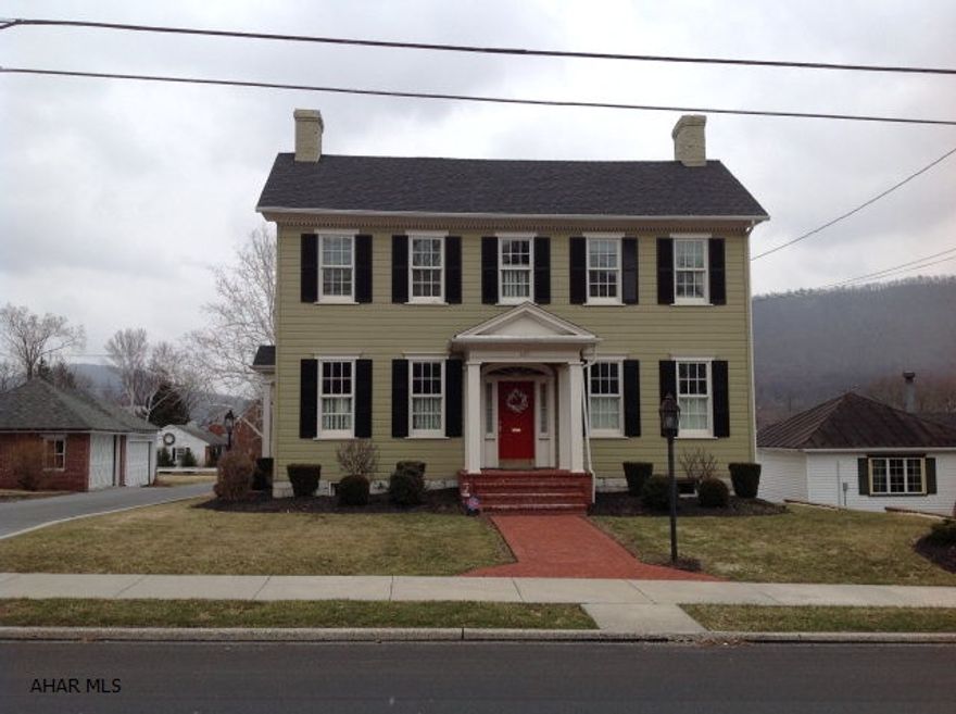 Nicely renovated historic home! Orginial pinewood flooring in dining and living rm, crown molding, and a fireplace. Claw foot tub in the full BA off the living rm. Custom cherry kitchen features, lg granite island with 2 sinks, 2 intergrated dishwasher and 2 disposals. Wine cooler, pocket panel pantry, recessed lighting, Wolf double ovens and warmer oven, lg 4 burner gas stove,Sub-Zero Intergrated cherry panel refrigerator and 2 drawer freezer. Radiant heated ceramic flooring, carpeted Master BA with his & her closet, french doors out to the balcony, granite double sinks and bath. Sunroom/breakfast nook leads out to the back deck and onto a spacious patio.  24x24 2 car detached garage.  A Must See!!