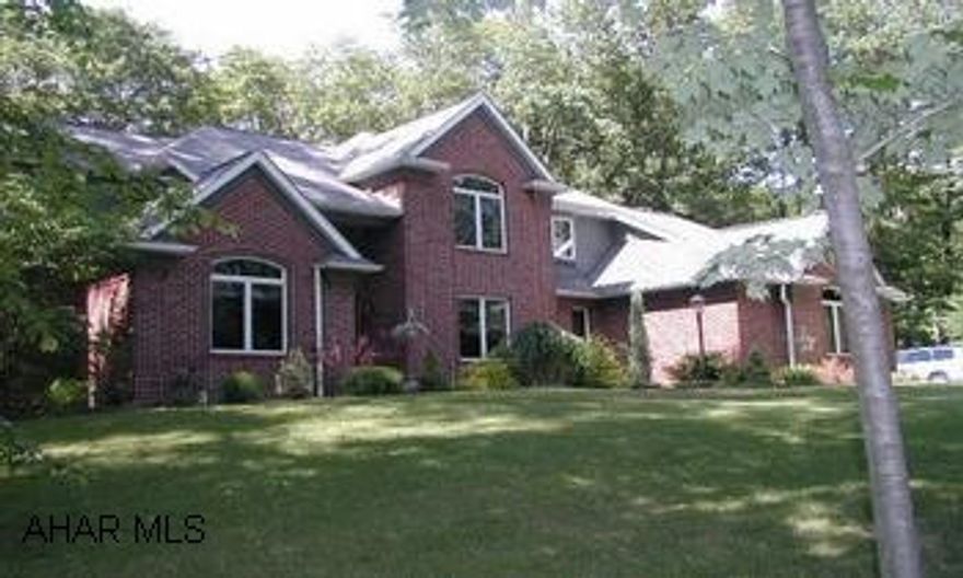 Stunning All Brick Home on  -1 Acre.  Very private flat lot - 4 bedrooms, 3 1/2 baths Stunning All Brick Home on  -1 Acre.  Very private flat lot - 4 bedrooms, 3 1/2 baths.  1st floor Masterbedroom w/master bath-1st floor laundry.  Bedrooms private bathrooms.  Ceramic & Hardwood floors on 1st floor.  New carpeting on 2nd floor.  Brick fireplace in Great room.  Kitchen has Granite Counter top on island & Oak cabinets, all oak trim  thru out .  3 car garage- See Pictures.