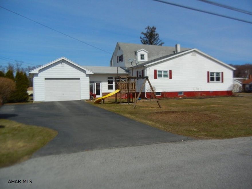 Immaculate 3 bedroom, 2 bath two story on large corner lot. 1st floor master bedroom. Attractive decor. Breezeway. Attached 1 car garage. This is a must see property.