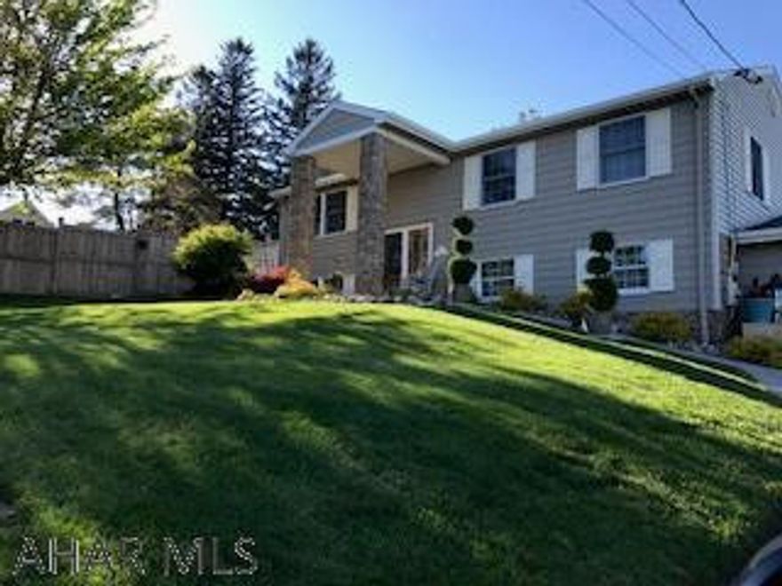 Immaculately maintained and updated home on large lot with some of the interior updates including 2.5 newly remodeled bathrooms and quartz countertops.  The large back yard has recently had extensive landscaping, deck, fences, and a pool added.  The downstairs bedroom is extremely large and can be separated to make two bedrooms on that level.  Must see so call for further details or a showing of the home.