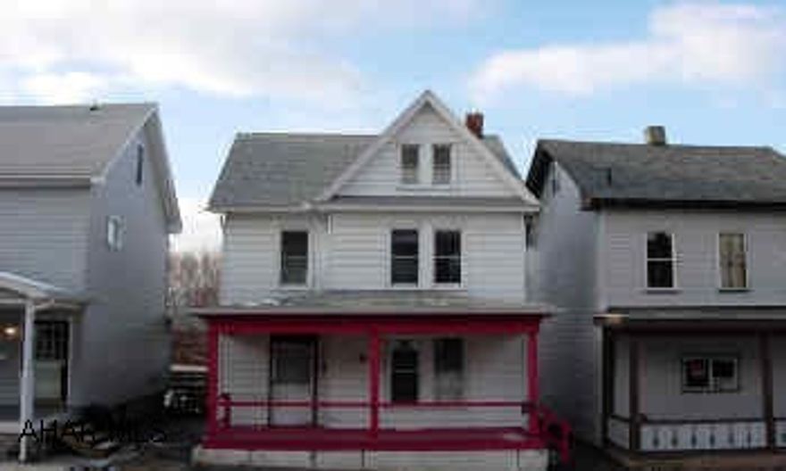 Nicely remodeled, 2-1/2 story.  Nicely remodeled  2-1/2 story .  New windows, roof, aluminum siding.  Large eat-in kitchen.  3 or 4 bedrooms, 1.25  baths.  Off street parking.  Priced to sell.