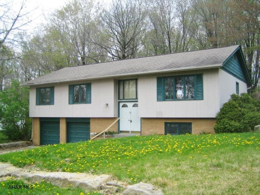 Nice sized Portage area Bi-Level home. Large living room and kitchen w/ dining area. Master bedroom and bath. Family room in basement with laundry and half bath. 2 car garage, large, private fenced lot and spacious wood deck. Needs some TLC. Property sold AS-IS. Seller will make no repairs. Buyer pays both transfer taxes. Equal Housing Opportunity. Insurable with repair escrow (see hudhomestore.com for details).