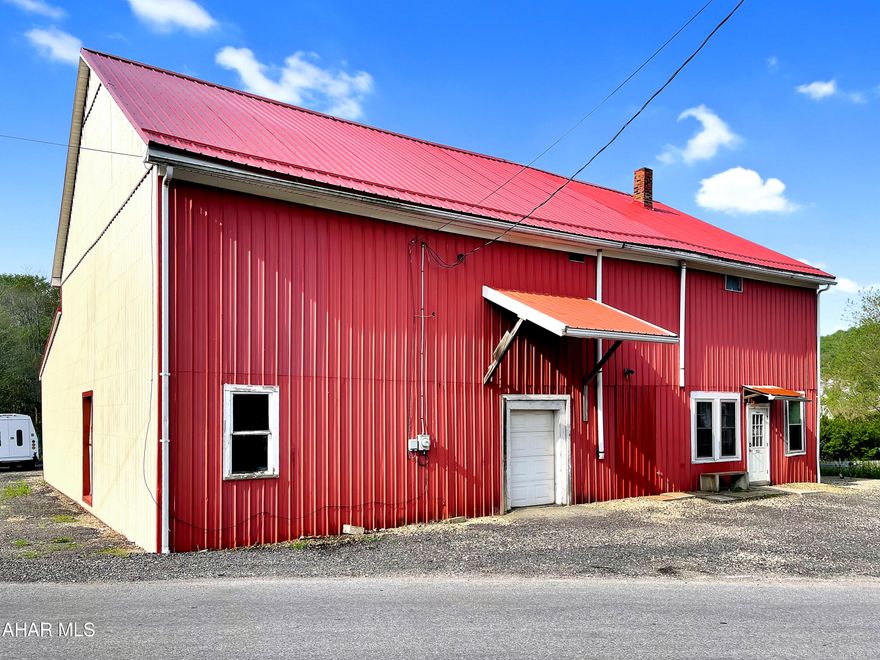 Originally Sybert's Feed Mill of Nanty Glo, built in 1912. This spacious 3,600 square foot building is perfect for storage space, a woodworking shop, or even a storefront. Brand new metal siding, metal roof, updated electrical, plumbing, & heating. The 2nd & 3rd floor of the property are unfinished but have the possibilities to add more space / income. Plenty of parking around the entire building & located in a highly trafficked area. Call today for your private tour!