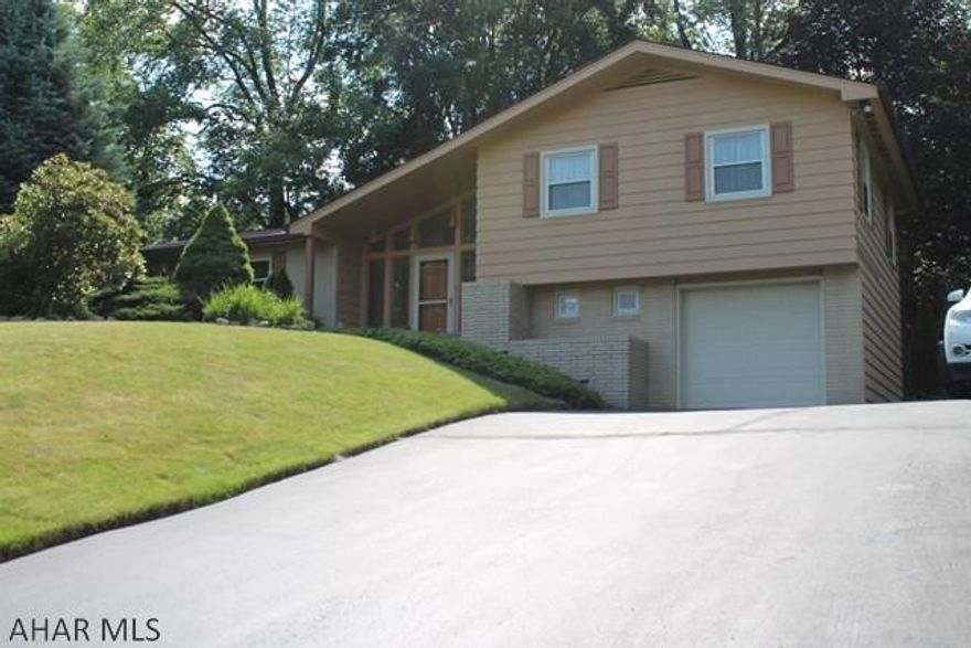 Welcome to your new home. This spacious home features two gas fireplaces and heated one car heated garage. Entertain in a beautiful eat-in kitchen with quartz countertops, cherry cabinets and tile flooring. This home is close to all the shopping and conveniences that Altoona has to offer while the property feels far from city living. This is a must see property, call for an appointment today as this home will not last long.
