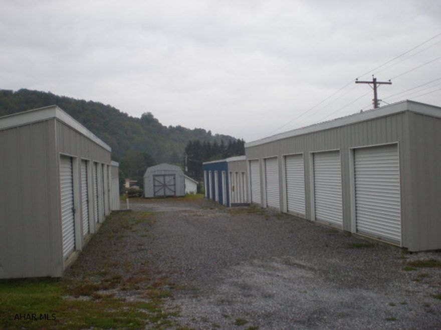 22 storage units built in 2003 on concrete floor with metal roof & siding.  7-6x10 units   14-10x10 units and 1 14x70  All units rented. No electric but is available.